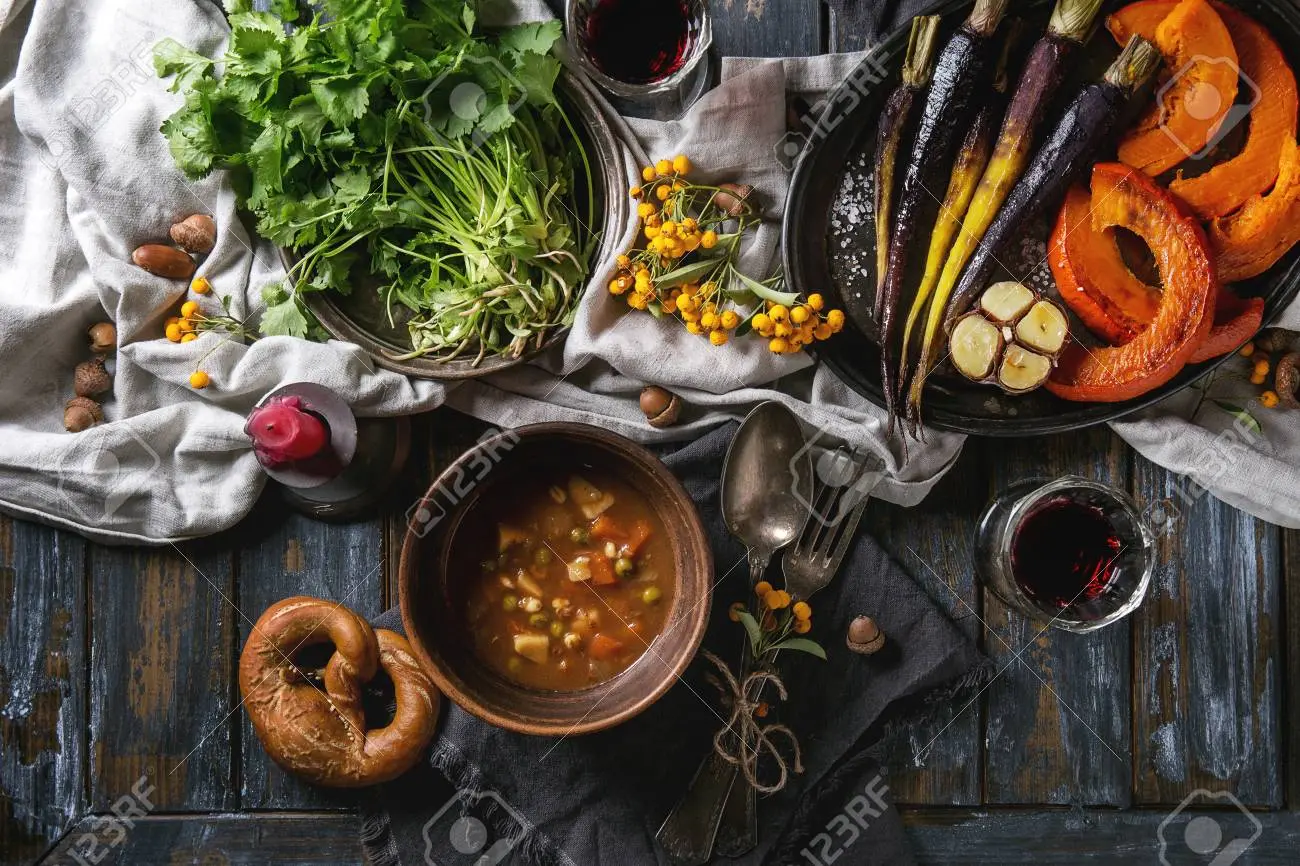 Bowl of seasonal grains and vegetables on a wooden table